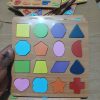 Wooden Geometric Shape Sorter Puzzle Board – 16 Pieces - Image 3